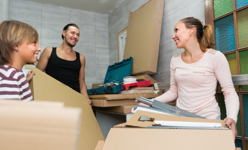 Professional packing service preparing household items for a move in Stockwell