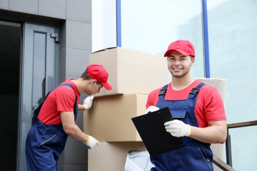 Careful handling of sofas and tables for storage
