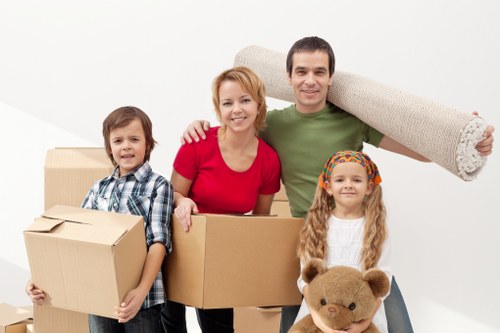 Careful loading of household items for a Stockwell flat removal