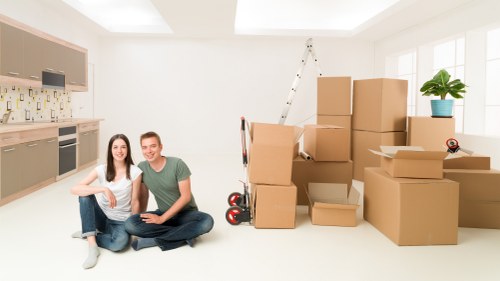 Reusable office furniture and boxes prepared for charity partnership donation