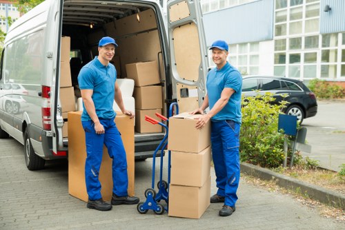 Local team loading furniture for secure storage