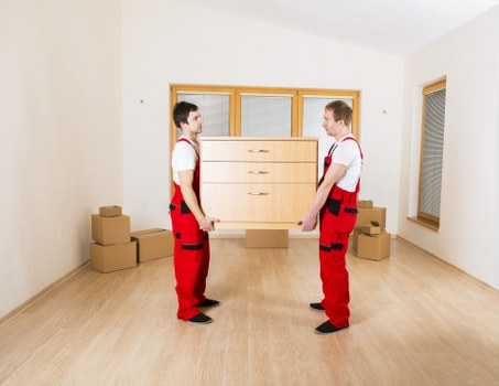 Organised boxes and furniture in a self storage space
